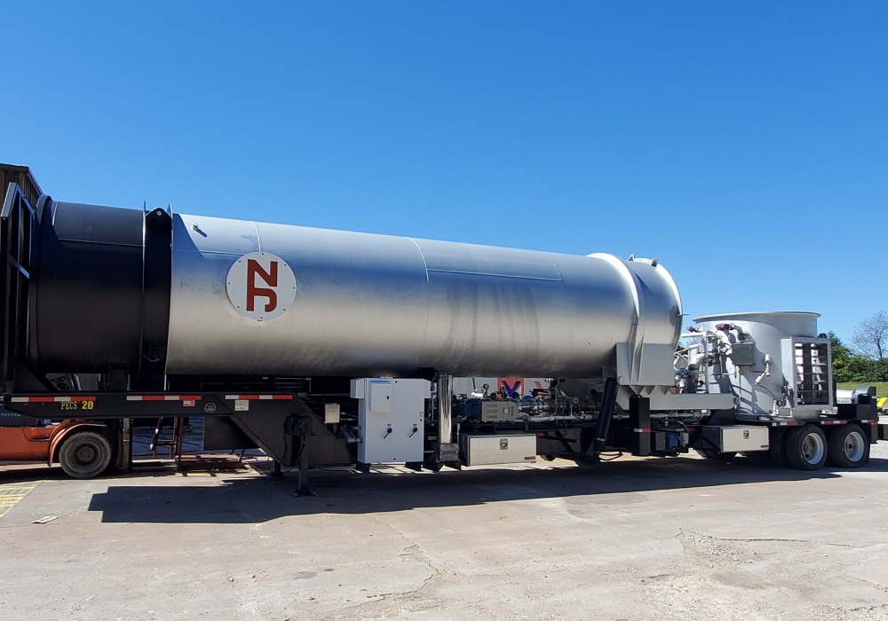 a large silver tanker truck