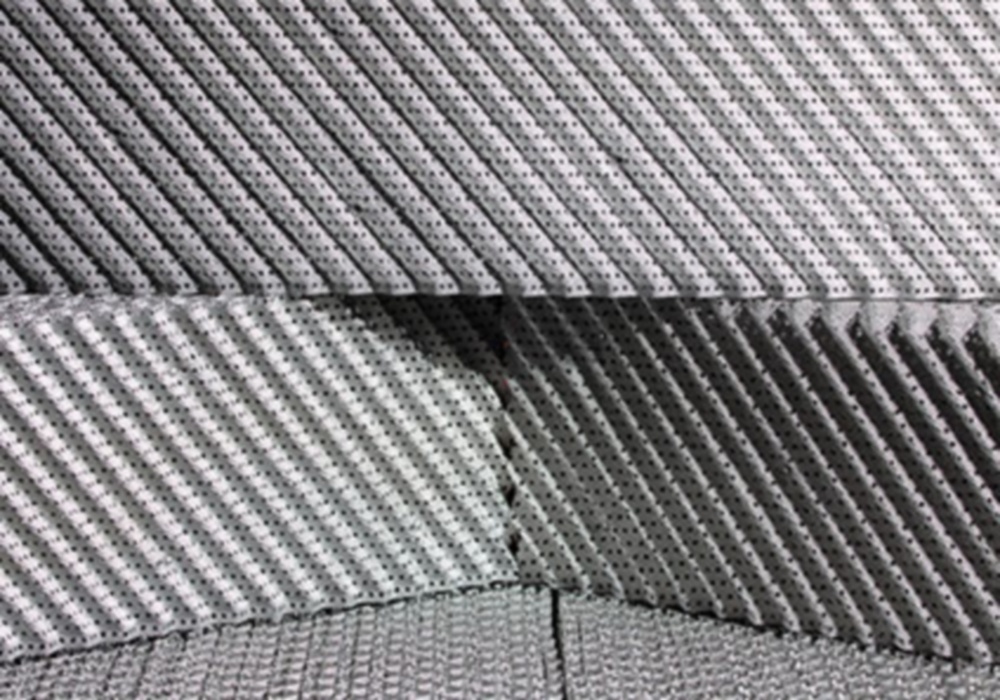 a close-up of a stack of grey and white foam