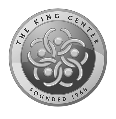 a silver coin with a logo