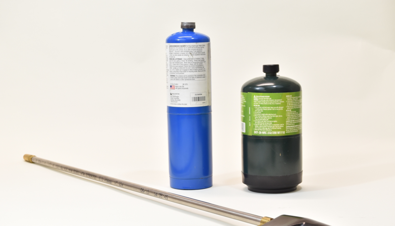 a blue bottle and a blue cylinder