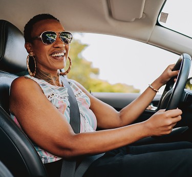 a woman driving a car