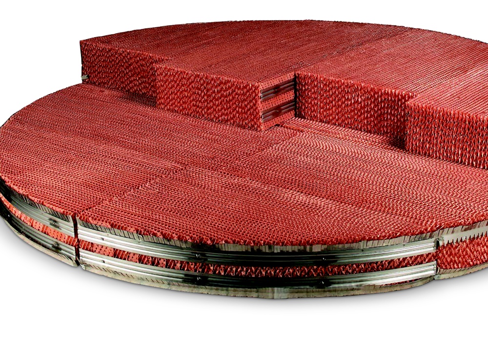 a red round platform with a few steps