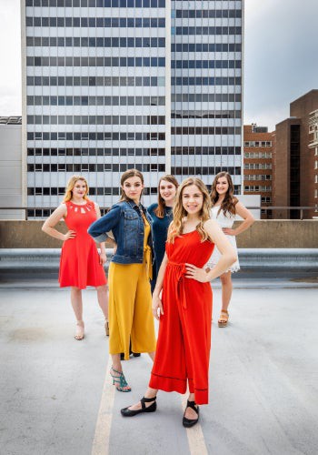 a group of women posing for a picture