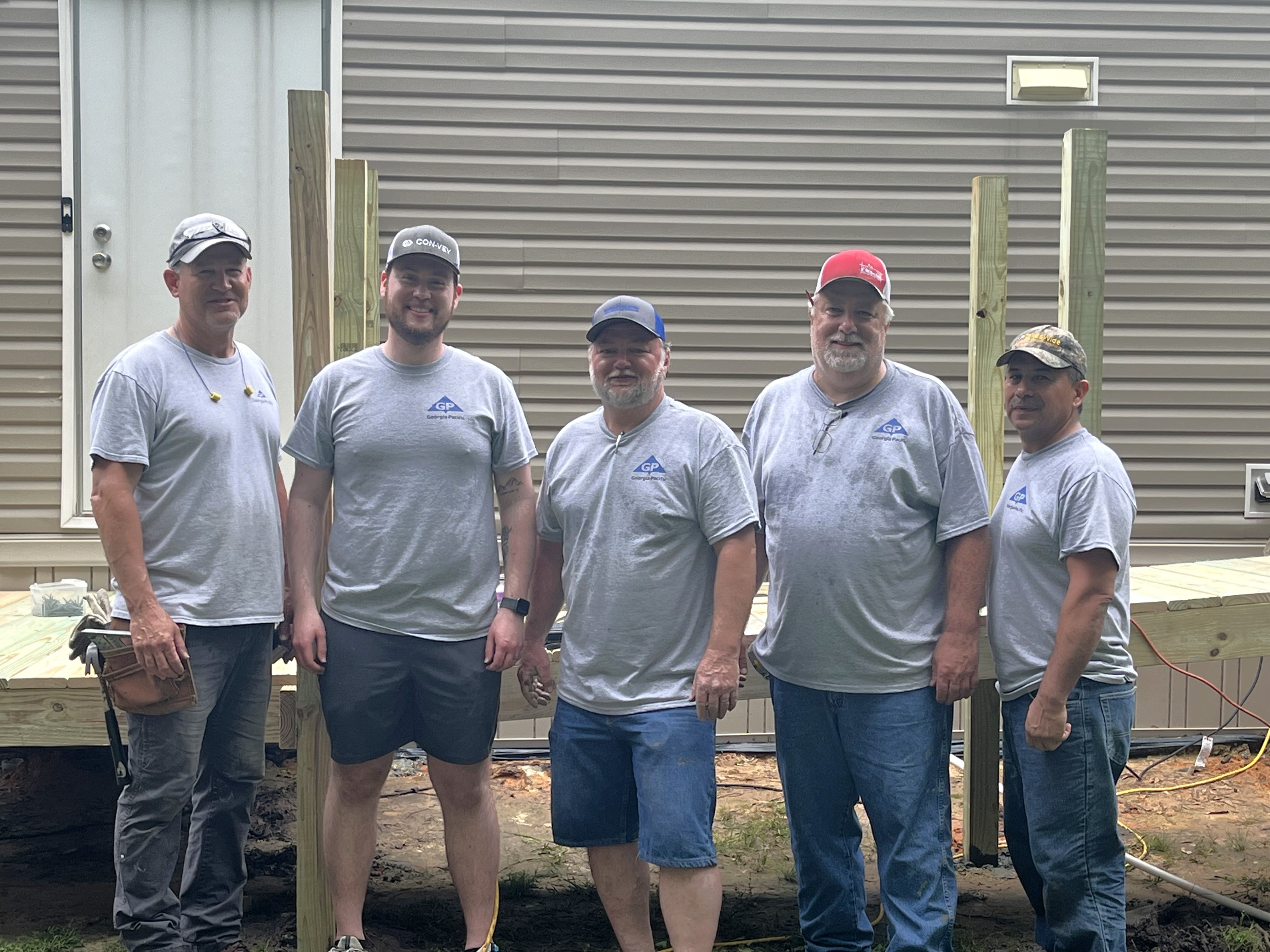 (From left to right,) Todd Belschner, Jonathan Cason, Bruce Thompson, Andy Parish, and Lee Tamez.