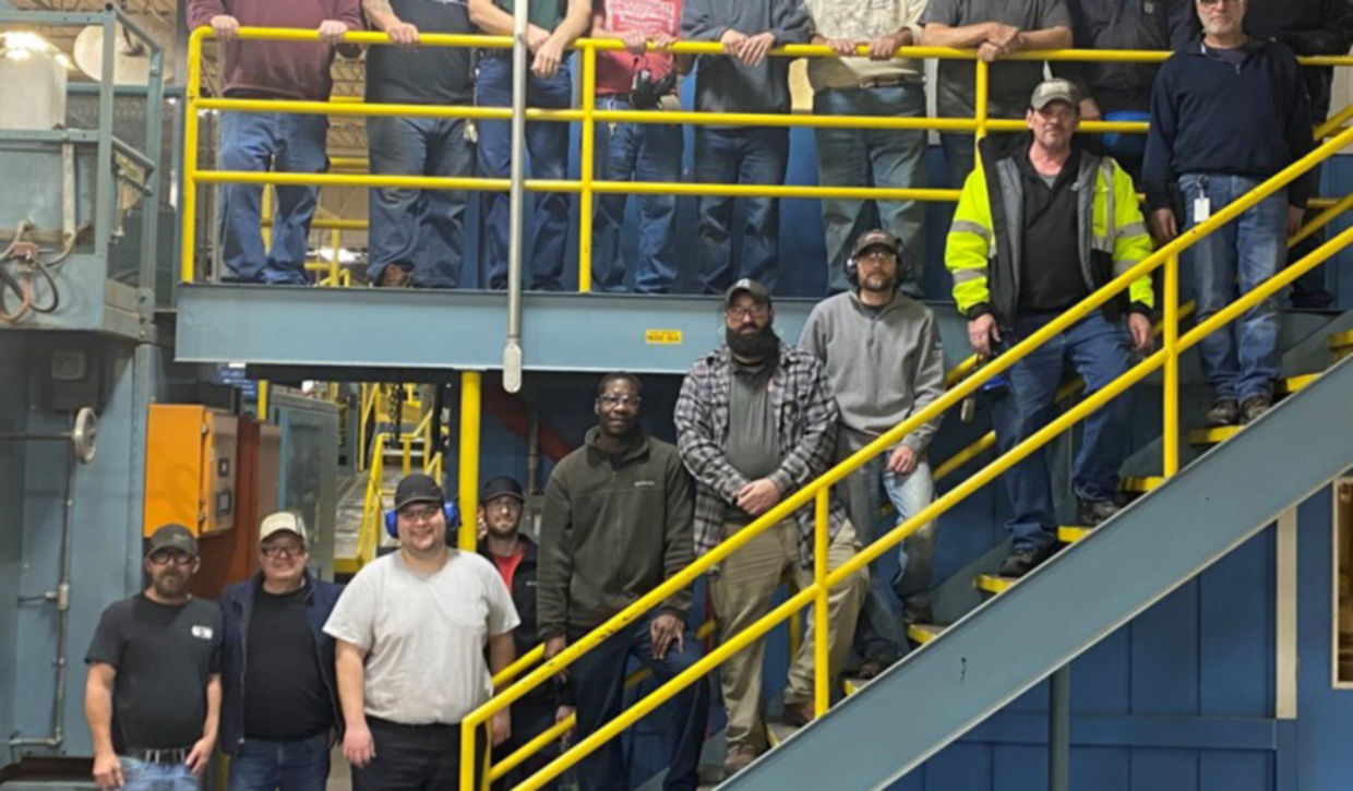 The Owosso team as they celebrated the corrugator milestone taken during the last shift change for the machine. 