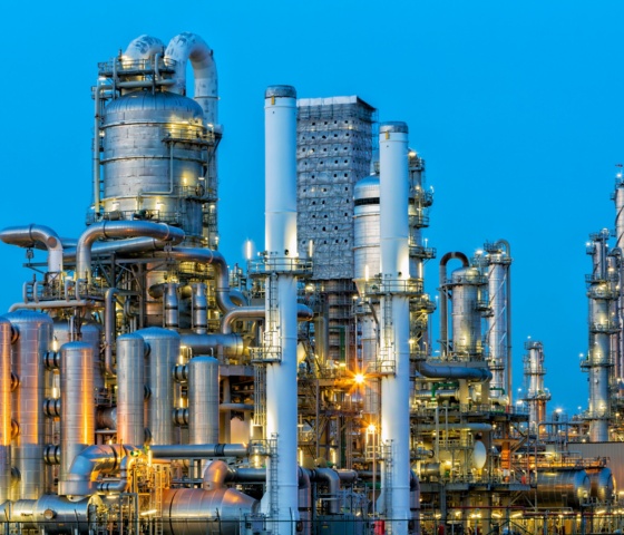 a large industrial plant with many pipes