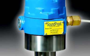 a blue and silver device with a yellow label