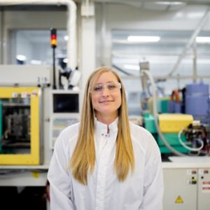 a woman in a lab coat