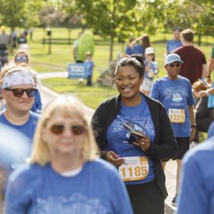 a group of people wearing blue shirts