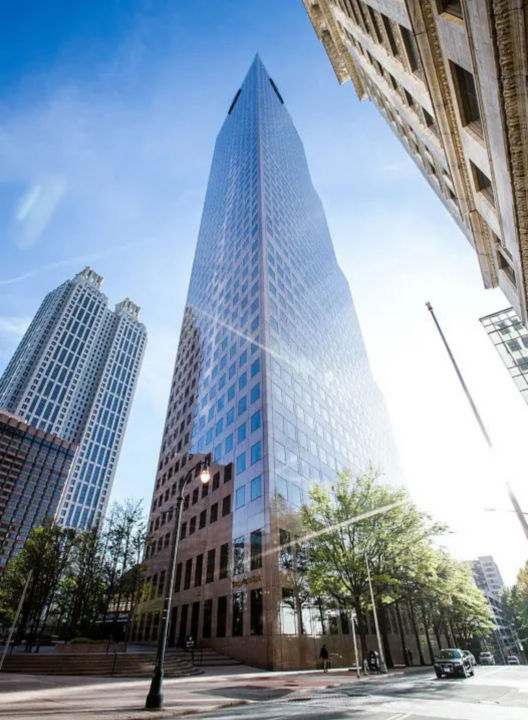 a tall building with a glass tower