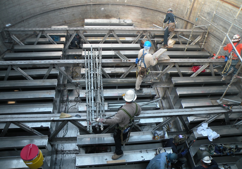 a group of men working on a construction site