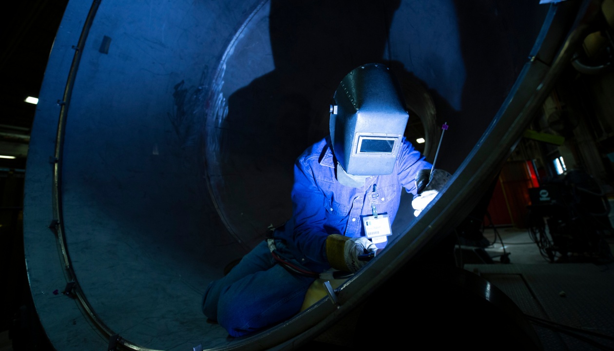 a person wearing a welding mask