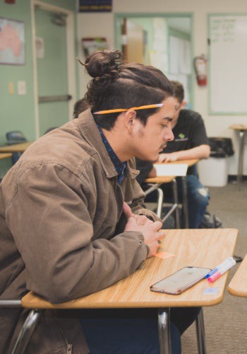 a man sitting at a desk
