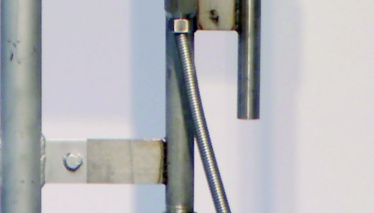 a close up of a metal bar