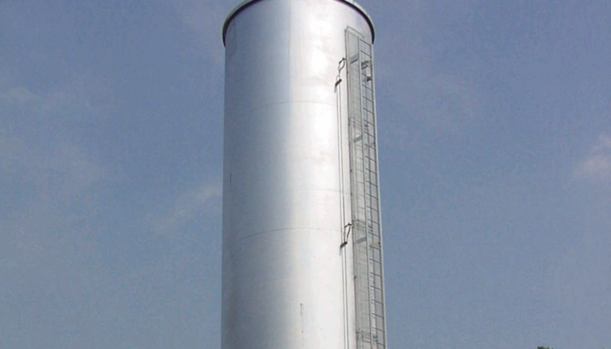 a large cylindrical metal tower